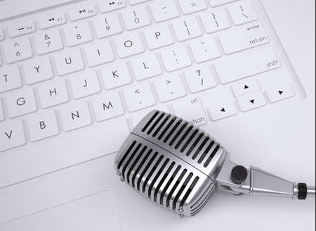 Old microphone on the keyboard  View from aboveの写真素材