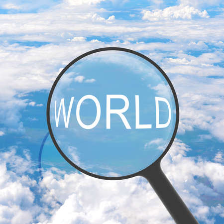 Magnifying glass looking WORLD  Clouds on background  Business conceptの写真素材
