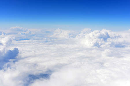 Blue sky and clouds  Top view of aircraft