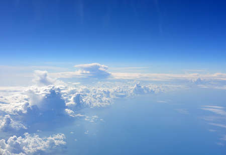 Blue sky and clouds  Top view of aircraft