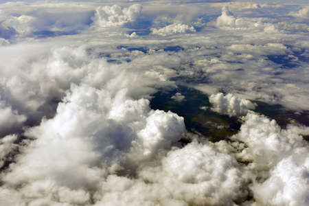 Blue sky and clouds  Top view of aircraft
