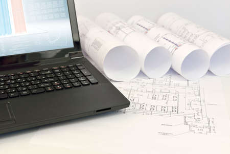 Scrolls drawings and tools of the architectの写真素材