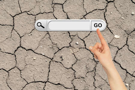 Human hand indicates the search bar in browser