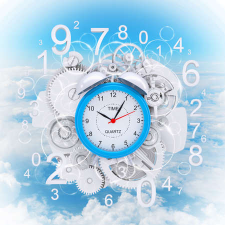 Alarm clock with figures and white gearsの写真素材