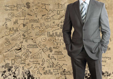Man in suit and business planの写真素材