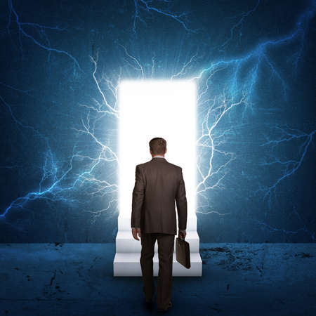 Businessman goes to stairsの写真素材