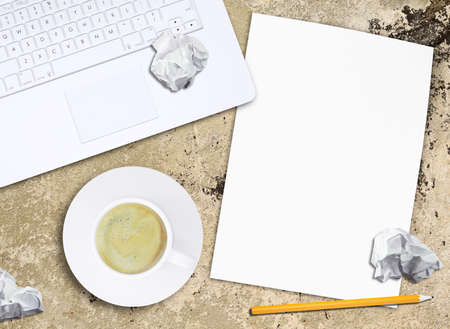 Laptop and coffee cupの写真素材