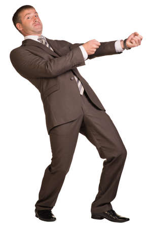 Businessman pulling ropeの写真素材