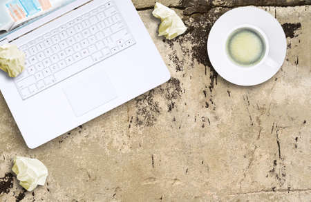 Laptop and coffee cupの写真素材