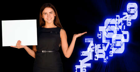 Businesswoman holding paper sheet