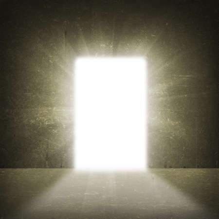 In concrete wall doorway with bright lightの写真素材