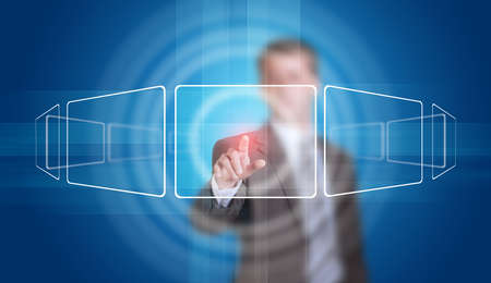 Businessman in suit finger presses virtual button