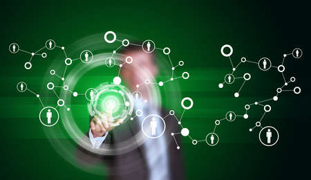 Businessman in suit finger presses virtual button