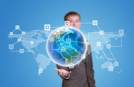 Businessman in suit hold Earth with network