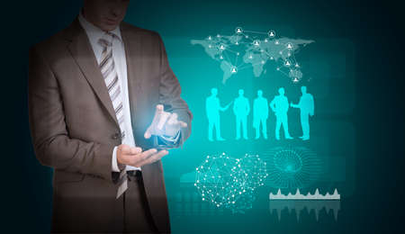 Businessman and man silhouettes with world mapの写真素材