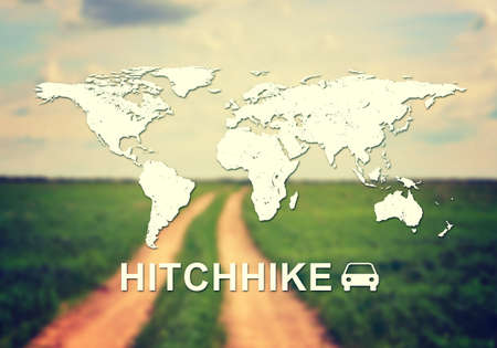 Contoured map of world continents with inscription Hitchhike and related symbol. Blurred photo of...