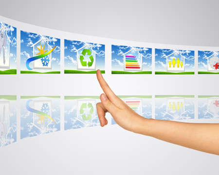 Icons smart buildings. Finger presses one of virtual screens. Mirror reflectionの写真素材
