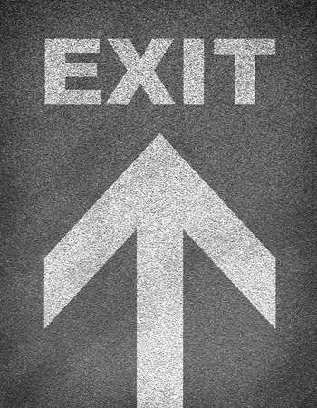 Asphalt road texture with arrow and word exit. Business conceptの写真素材