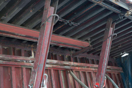 Rusty iron construction with reinforcing bar mesh