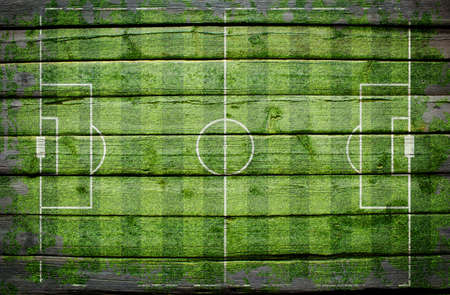 Football stadium with gates painted on wood plank, top viewの写真素材