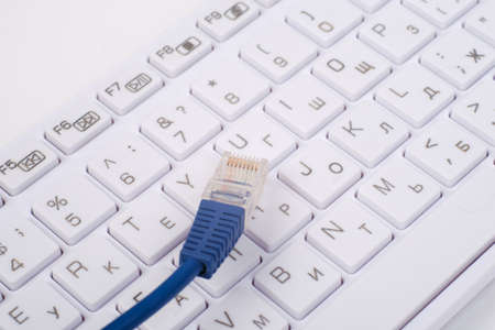 Computer keyboard with cable, close up viewの写真素材