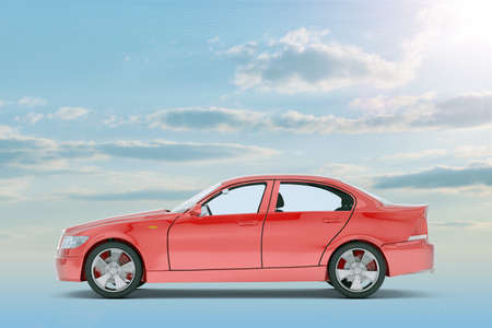 Red car on blue sky background, side viewの写真素材