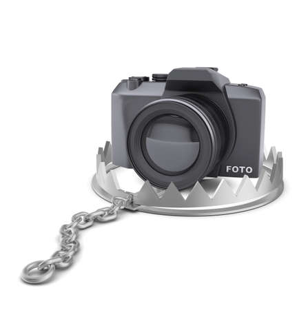 Camera in bear trap on isolated white background, close-up viewの写真素材