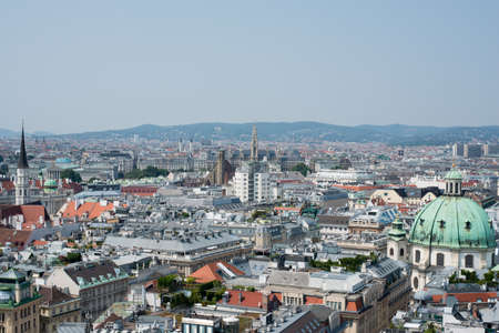Top view of city with houses and mountainsの写真素材
