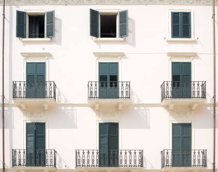 House with balconies and balcony railings with doorsの写真素材
