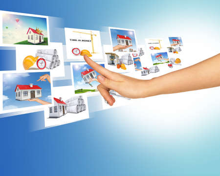 Humans arm and with holographic pictures on abstract background
