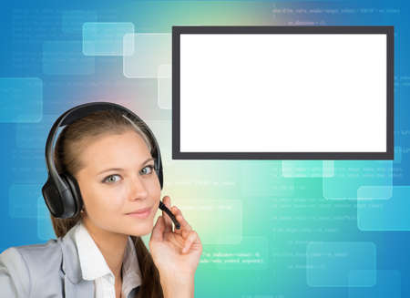 Businesslady in earphones looking at camera on abstract blue background with moleculeの写真素材