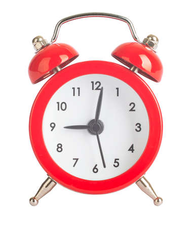 Red alarm clock on isolated white backgroundの写真素材