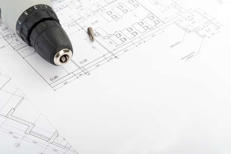 Grey screw driver on draft, close up view