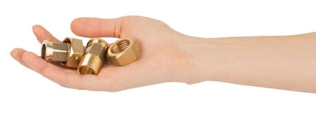 Humans hand holding pipe fittings on isolated white background
