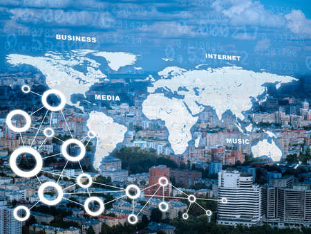 Cityscape with world map and computer iconsの写真素材
