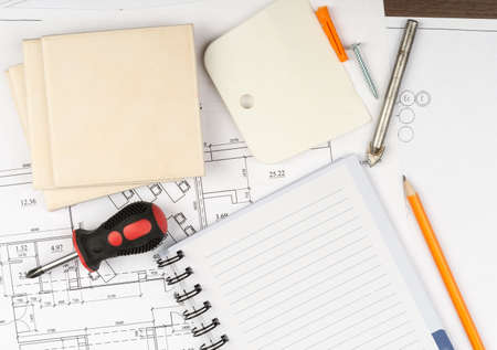 Copy book with pencil and tiles on draft backgroundの写真素材