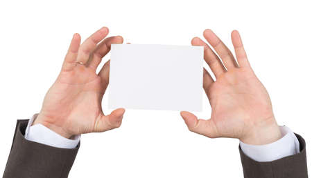 Businessman holding blank paper on isolated white background