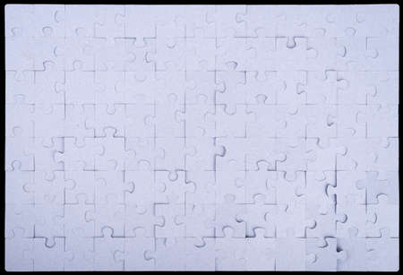 Grey puzzle set pieces on black backgroundの写真素材