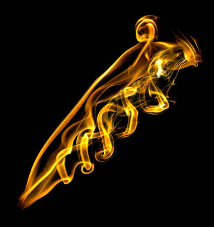Gold fire flame with twirls and lightspotsの写真素材
