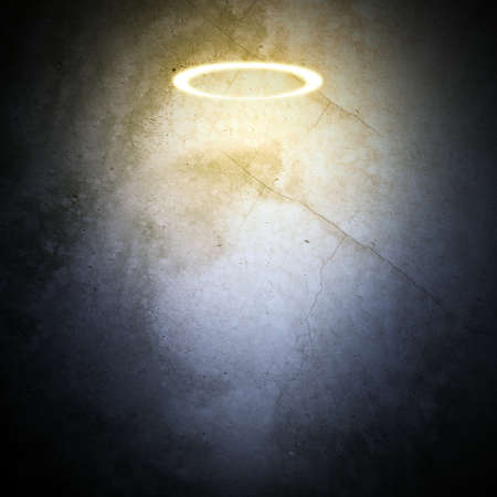 Nimbus on grey wall background with lightの写真素材