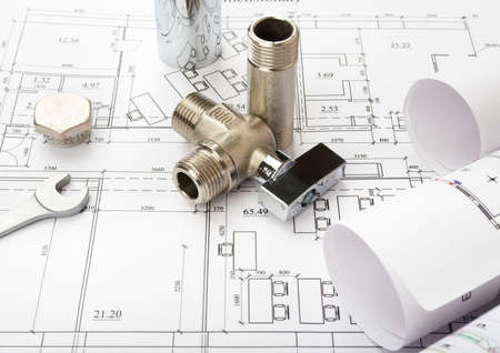 Architecture plan with mixer tap and turn-screw. Building conceptの写真素材