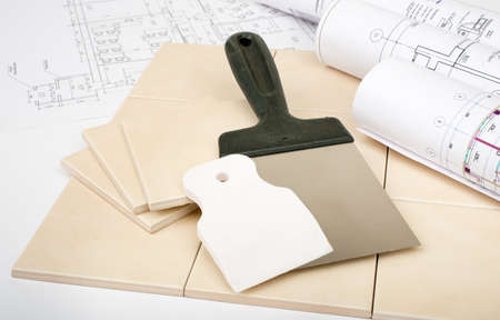 Set of tiles with blueprints and pallet-knife, closeupの写真素材