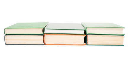 Pile of books isolated on white background, closeupの写真素材