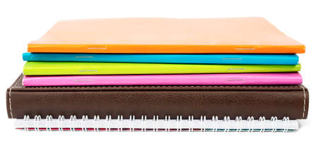 Pile of notebooks isolated on white backgroundの写真素材