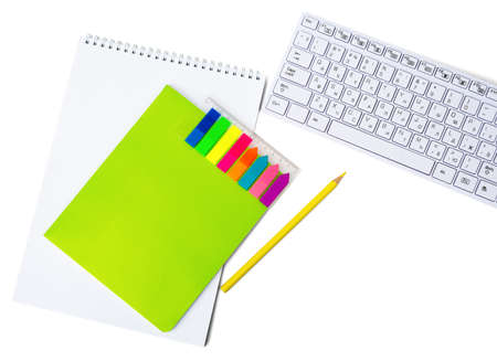 Notebooks with keyboard and pencil isolated on white backgroundの写真素材