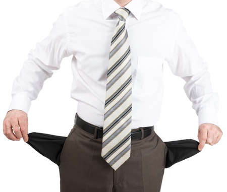 Businessman turned out his pockets isolated on white background, closeupの写真素材