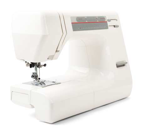 White sewing-machine isolated on white background, closeup
