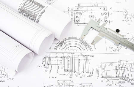 Architecture plan and rolls of blueprints with pencil and ruler. Building conceptの写真素材