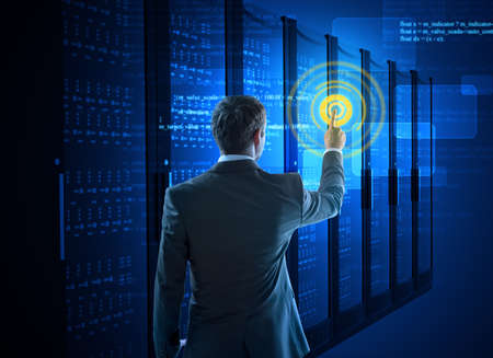 Business man using circle interface in data center. Technology concept