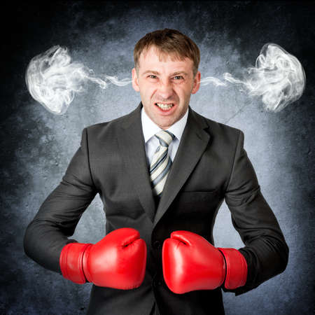 Closeup portrait angry man, blowing steam coming out of ears. Negative emotions, facial expressions